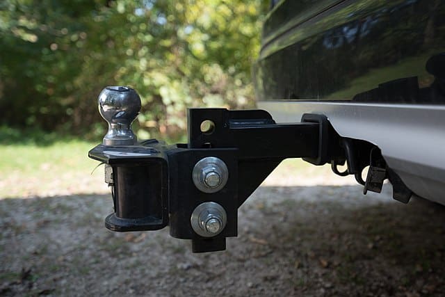 1. A weight distribution and sway control trailer hitch